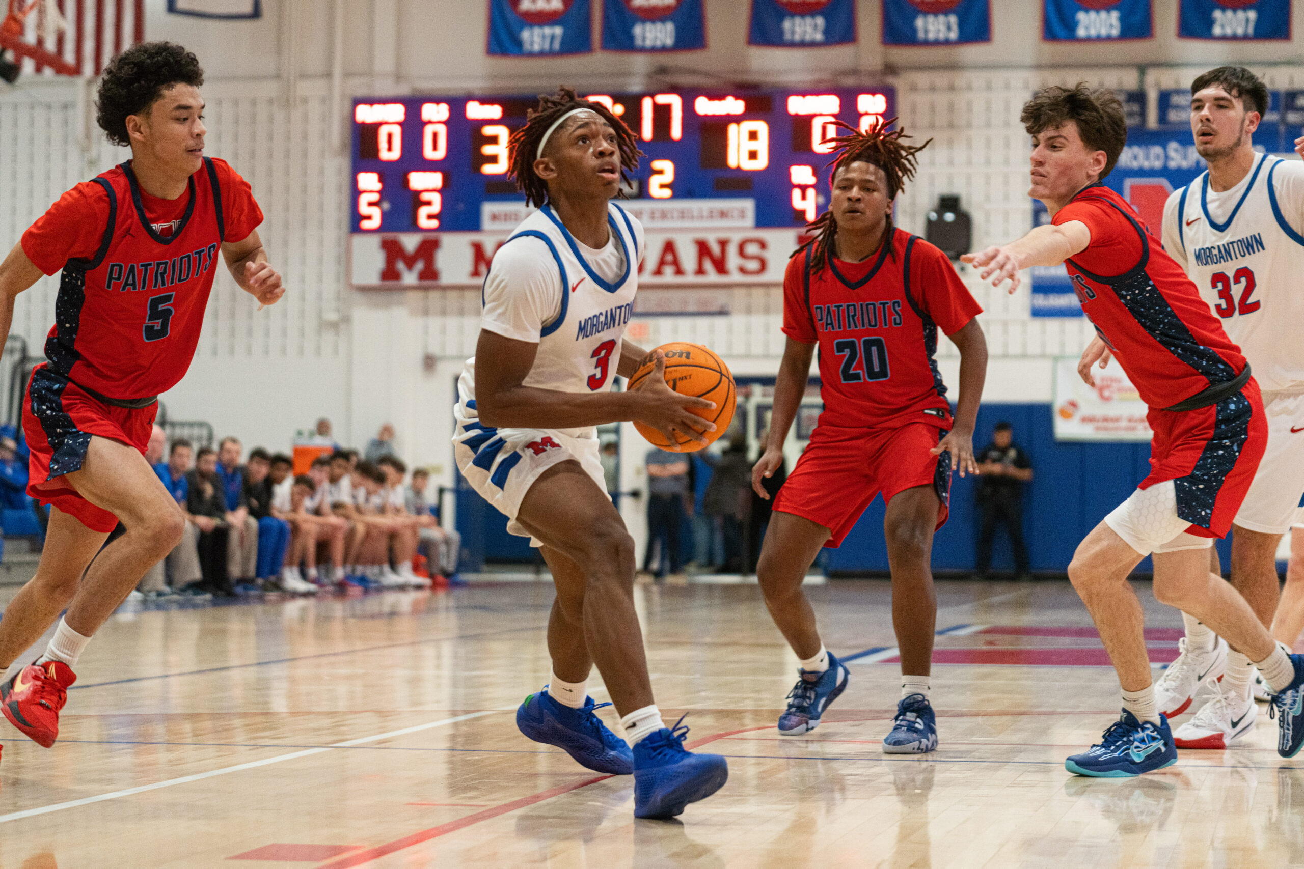 MHS boys basketball wins 50th consecutive game at home with 67-38 victory over Washington